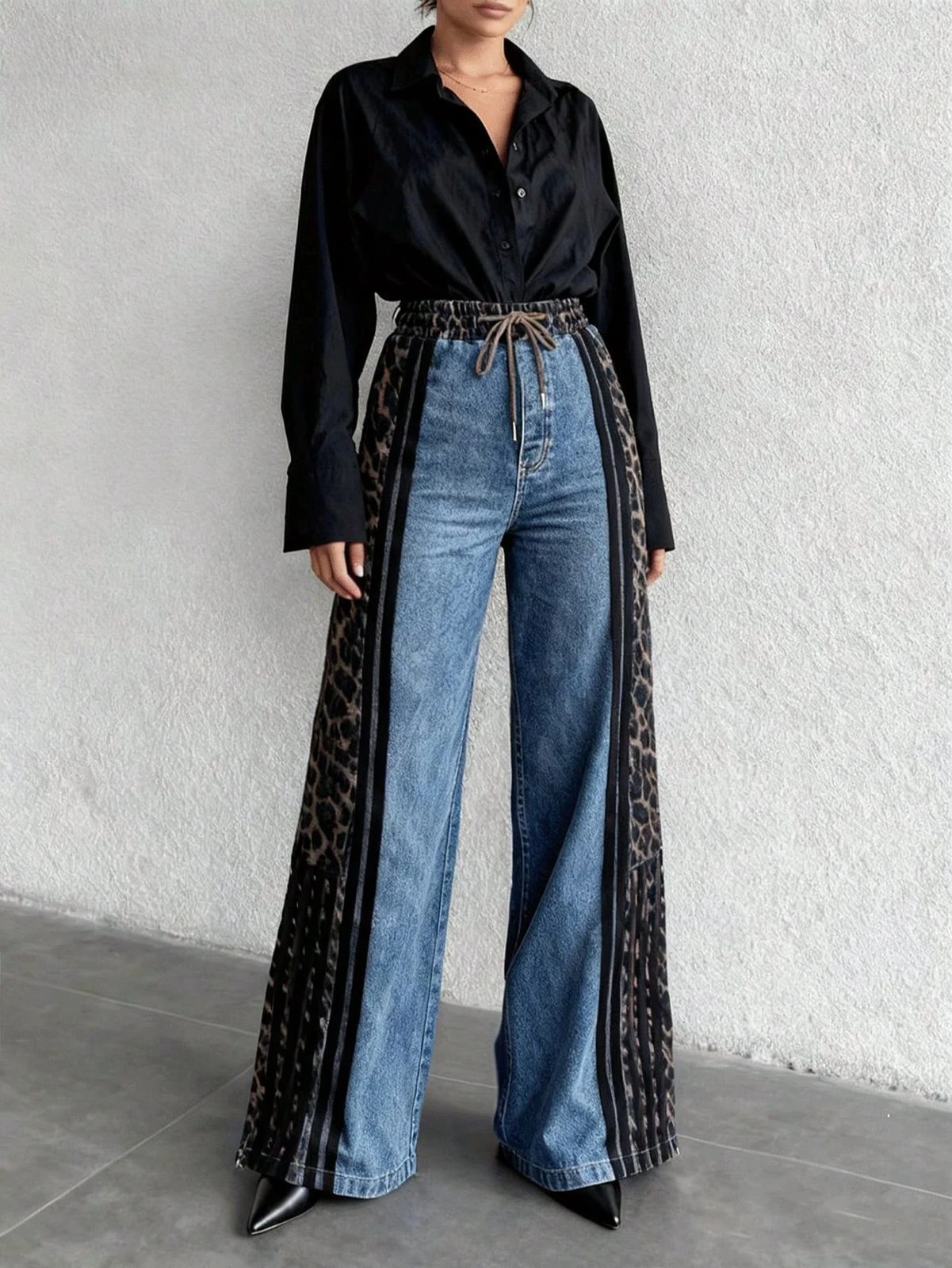 Jeans acampanados con diseño de animal print-DK2033