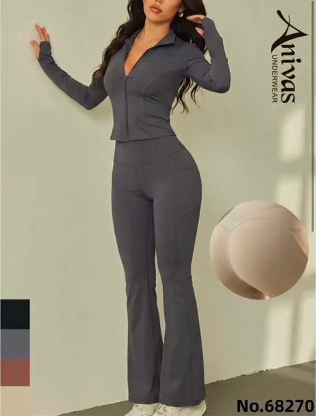 Conjunto deportivo de top con cierre y leggings acampanados