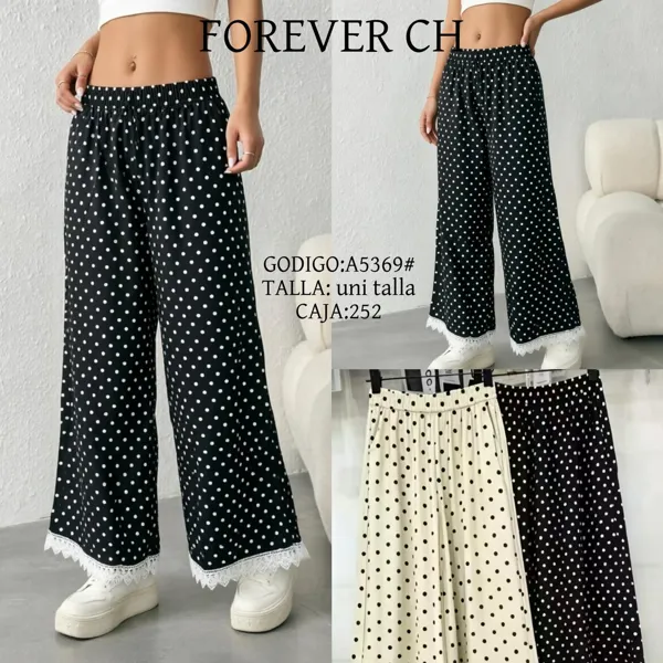 Pantalones con estampado de puntos y detalle de encaje