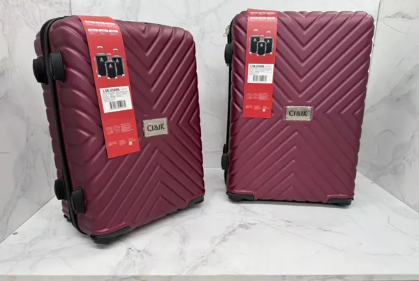 Set de maletas rígidas ABS de 2 piezas con 4 ruedas giratorias, color vino, diseño en zigzag