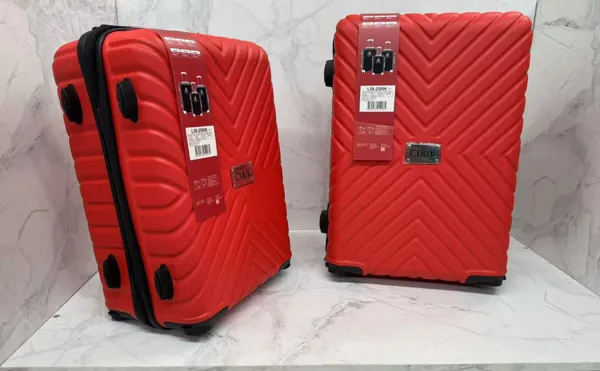 Set de maletas rígidas ABS de 2 piezas con 4 ruedas giratorias, color rojo, diseño en zigzag