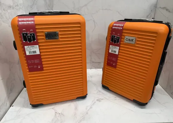 Set de maletas rígidas ABS de 2 piezas con 4 ruedas giratorias, color naranja, líneas horizontales