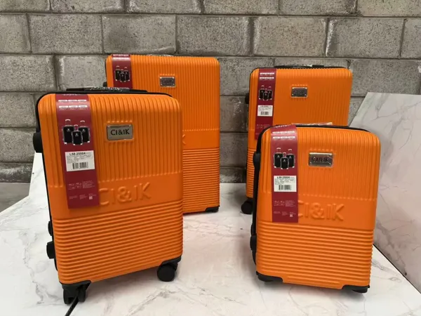 Set de maletas rígidas ABS de 4 piezas con 4 ruedas giratorias, color naranja