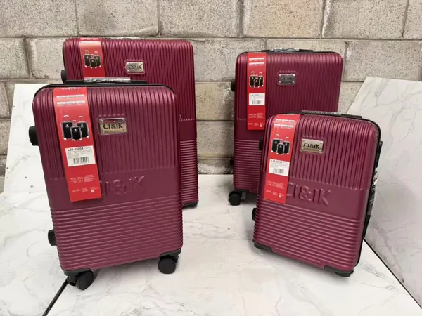 Set de maletas rígidas ABS de 4 piezas con 4 ruedas giratorias, color vino