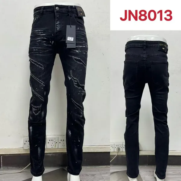 Jeans con efecto desgastado y salpicaduras