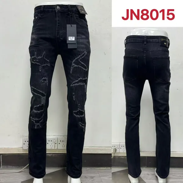 Jeans slim fit con efecto desgastado