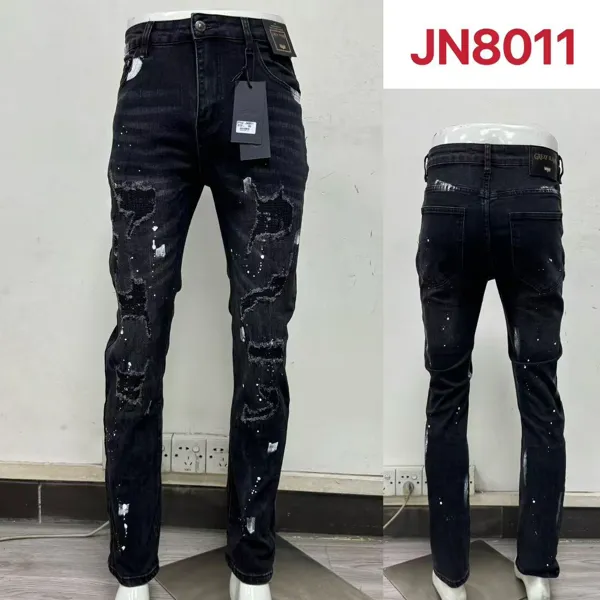 Jeans con efecto de pintura y rasgaduras