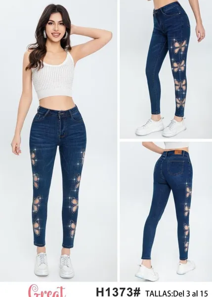 Jeans con cortes de mariposa y pedrería