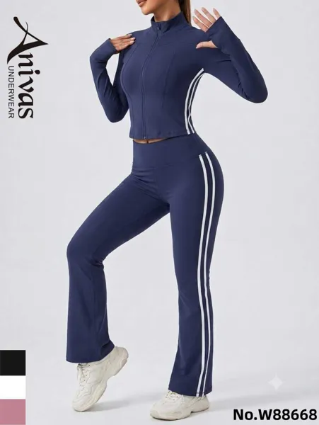 Conjunto deportivo de chaqueta con cierre y pantalon acampanado con franjas