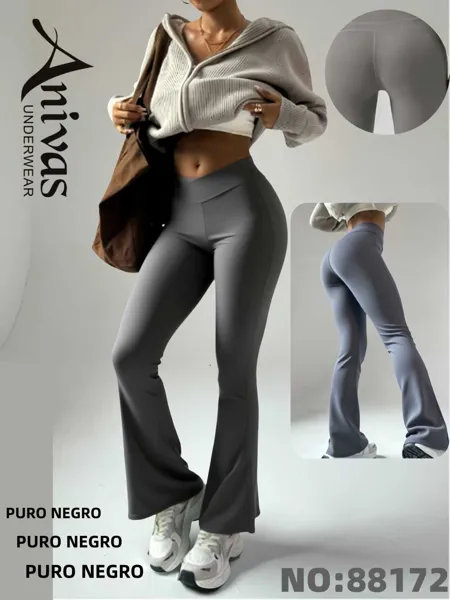 Pantalón deportivo acampanado de cintura cruzada en negro