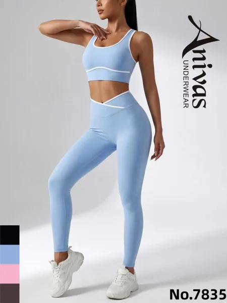 Conjunto deportivo de top y leggings de cintura cruzada con ribete