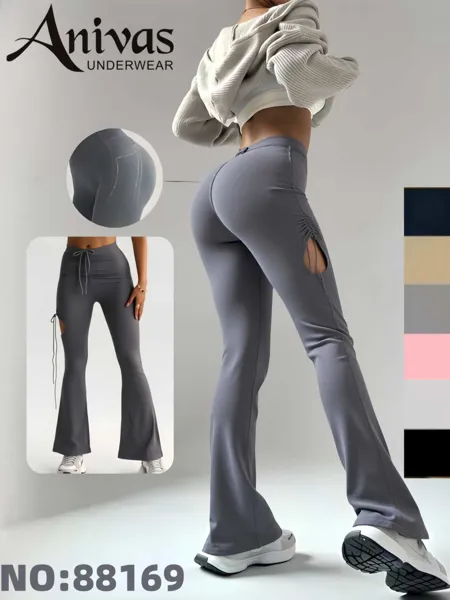 Pantalones deportivos acampanados de tiro alto con abertura