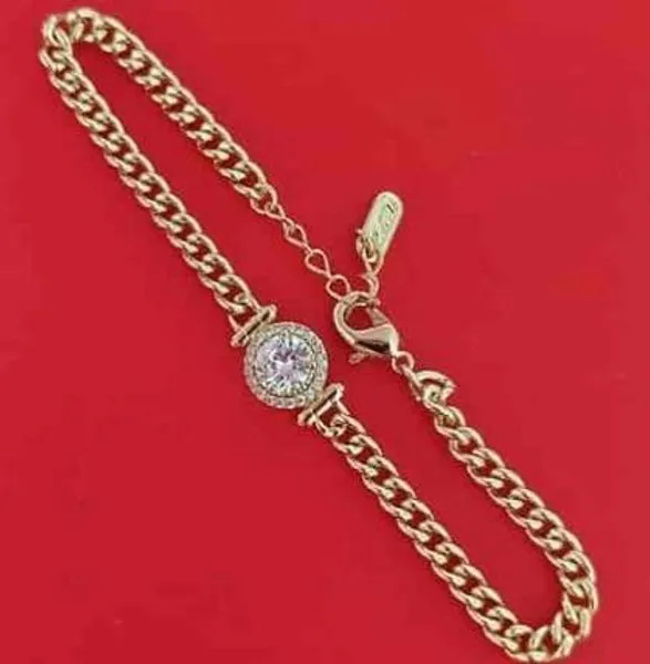 Pulsera dorada de cadena con circonia