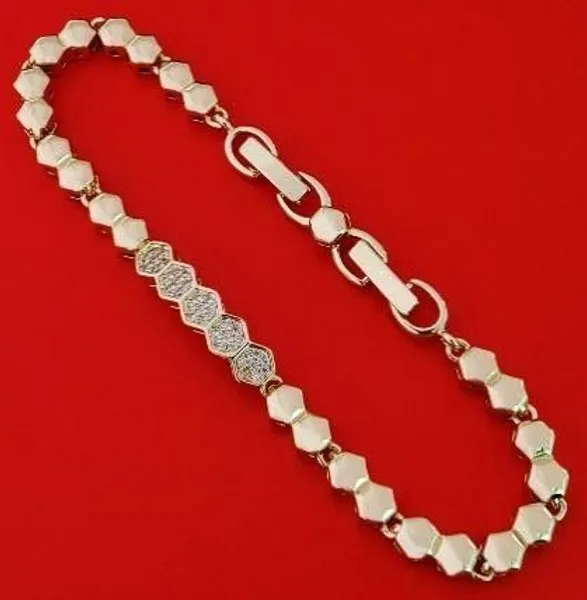 Pulsera dorada de eslabones con circonias