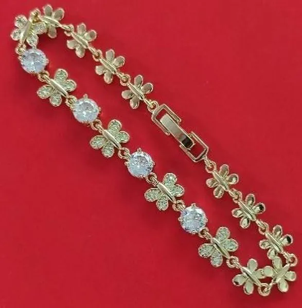 Pulsera dorada de flores con cristales