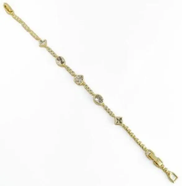Pulsera dorada delgada con cristales