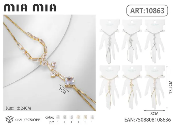 Pulsera de mano dorada con circonias baguette