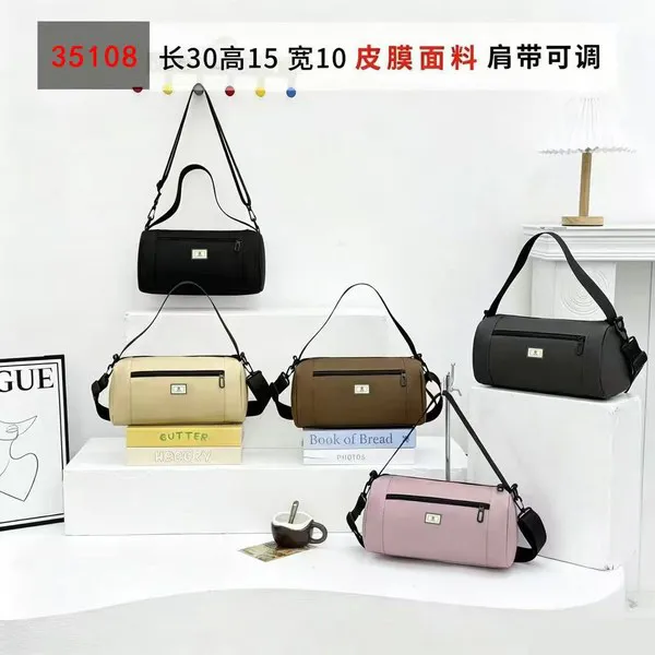 Bolso de mano tipo cilindro para dama