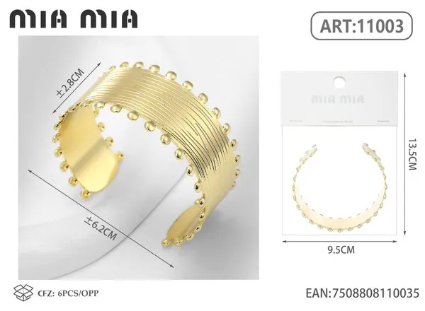 Brazalete de moda dorado con textura de líneas y borde de bolitas