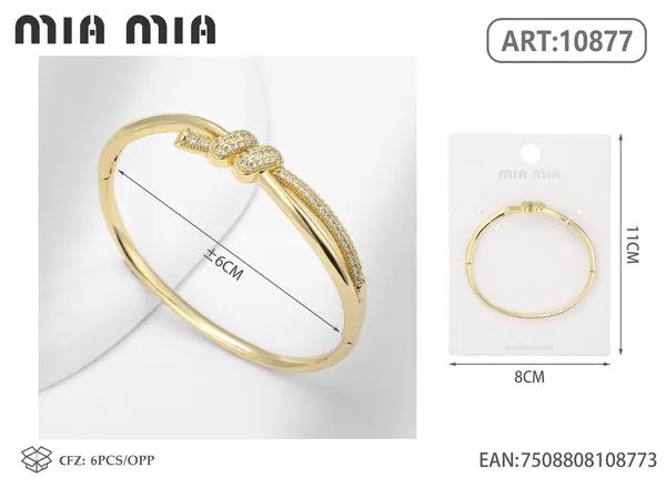 Brazalete de moda dorado con diseño de moño y circonias