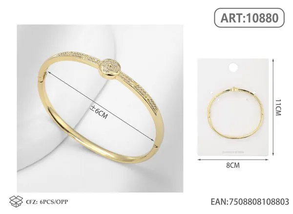 Brazalete de moda dorado con medallón de circonias