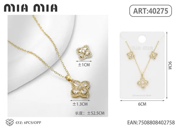 Juego de collar y aretes con dije de flor de cristal dorado