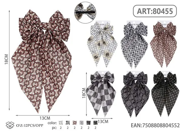 Broche para cabello de moño con colas largas y estampado geométrico café
