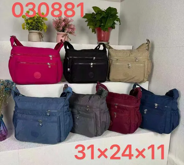 Bolsa cruzada de tela para dama