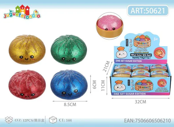 Bao antiestrés squishy de 8.5 cm con brillantina dorada y carita