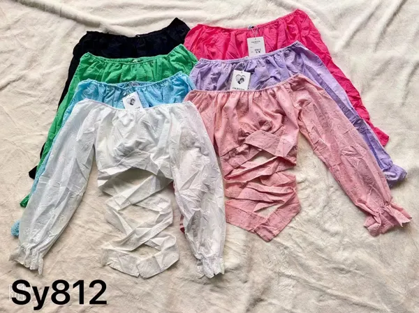 Blusa de hombros descubiertos con lazos